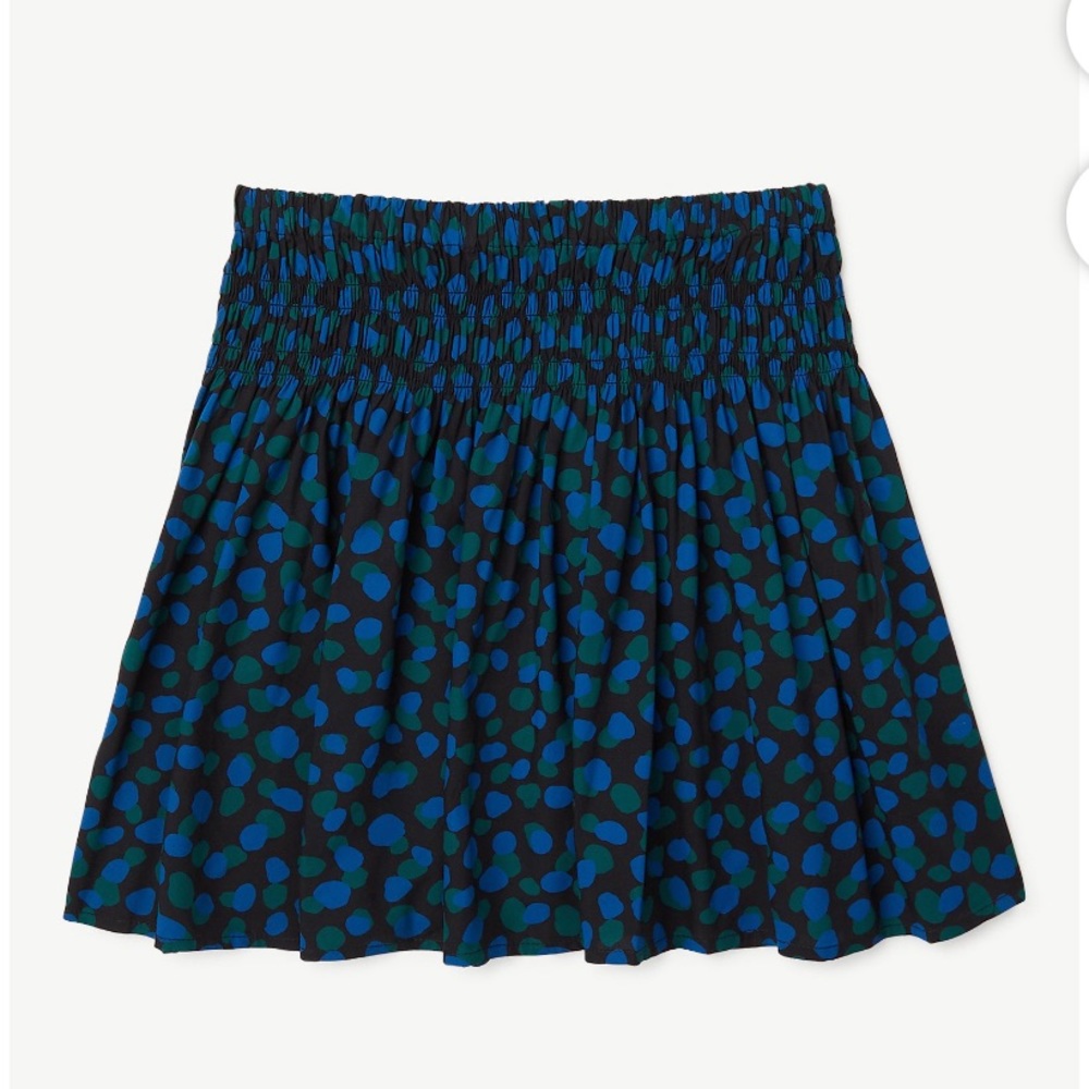 Girls smocked waist skirt is easy to layer and so cool for Spring and summer!